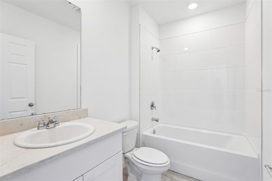 Furnished interior view inside a new home in Lake Deer Estates - Signature Series, Poinciana (Image 12). Furnished interior view inside a new home in Lake Deer Estates - Signature Series, Poinciana (Image 12).