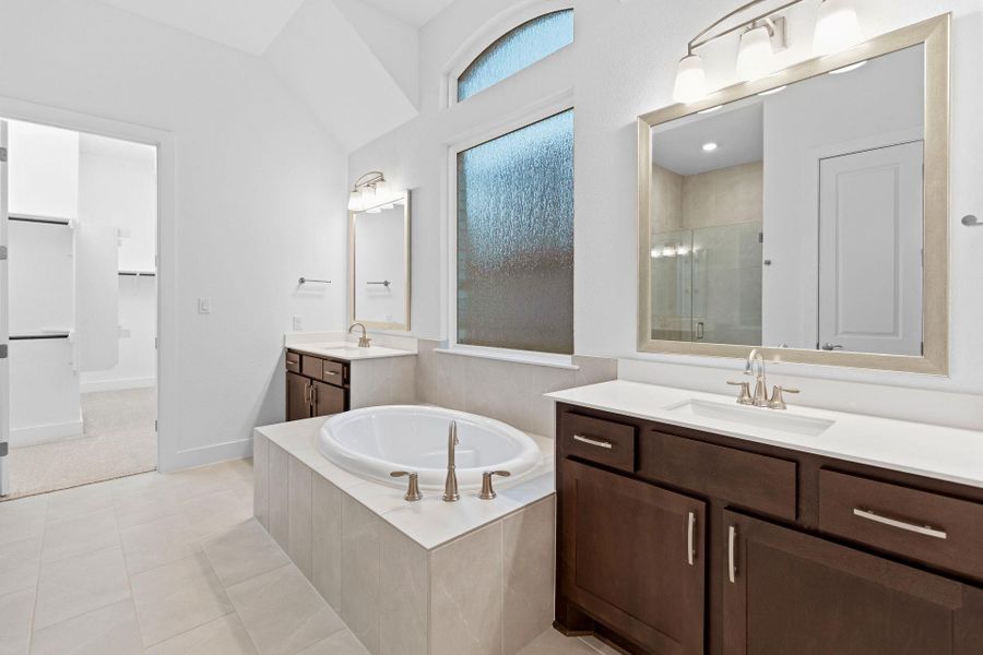 Primary Bath retreat with dual vanities & garden tub