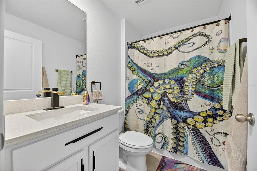 Furnished interior view inside a new home in North Park Isle, Plant City (Image 35).