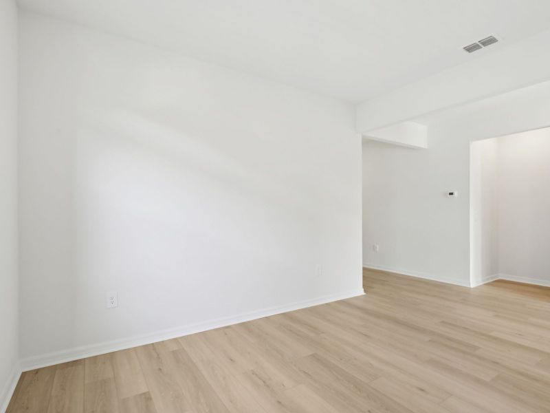 Spacious, unfurnished interior of a new home in Coasterra - Reserve Series, Palmetto (Image 15).