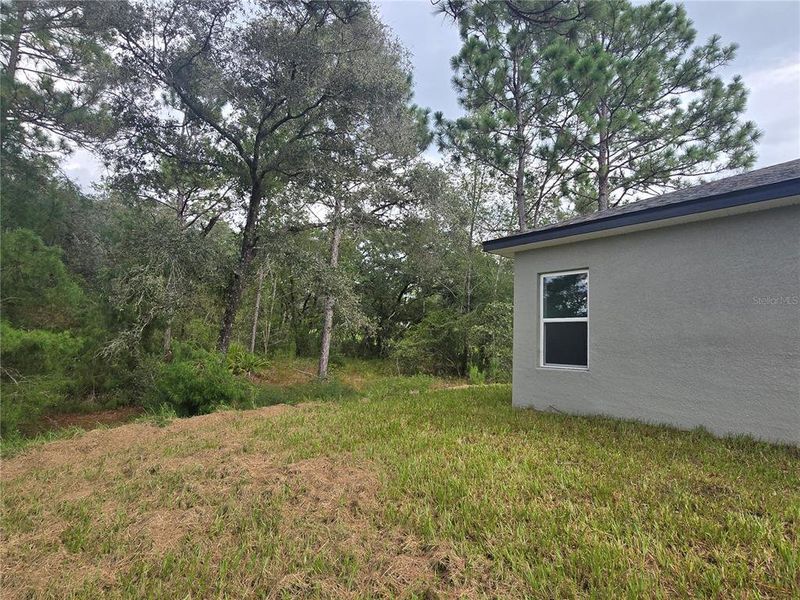 Front exterior of a new home in , Citrus Springs, FL, highlighting curb appeal (Image 12).