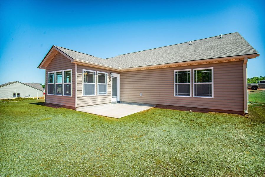 Representative exterior photo of a completed home built from the Jackson by Enchanted Homes in Ballentine Ridge, Lyman, SC (Image 2).