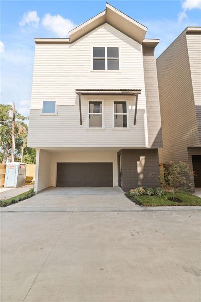 Front exterior of a new home in , Houston, TX, highlighting curb appeal (Image 22). Front exterior of a new home in , Houston, TX, highlighting curb appeal (Image 22).