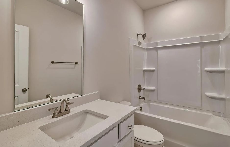 Furnished interior in a model home at Satchel Ford in Columbia (Image 3).