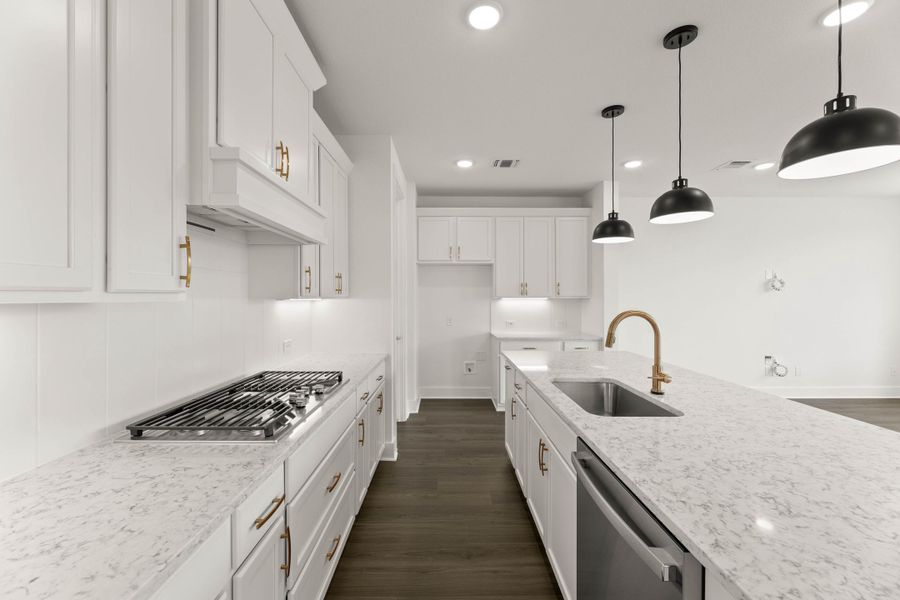 Representative furnished interior of a home built from the Laurel by Tri Pointe Homes in Treeline, Justin (Image 9).