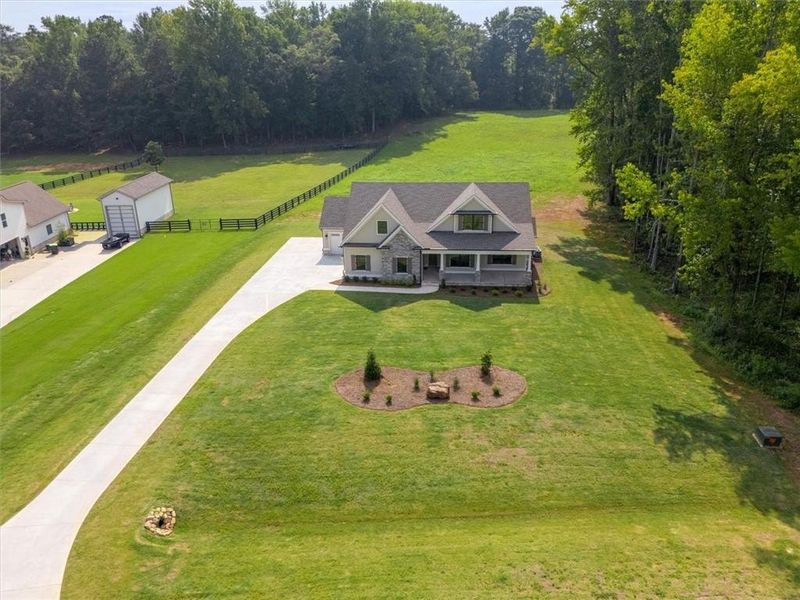 Front exterior of a new home in , Covington, GA, highlighting curb appeal (Image 23).