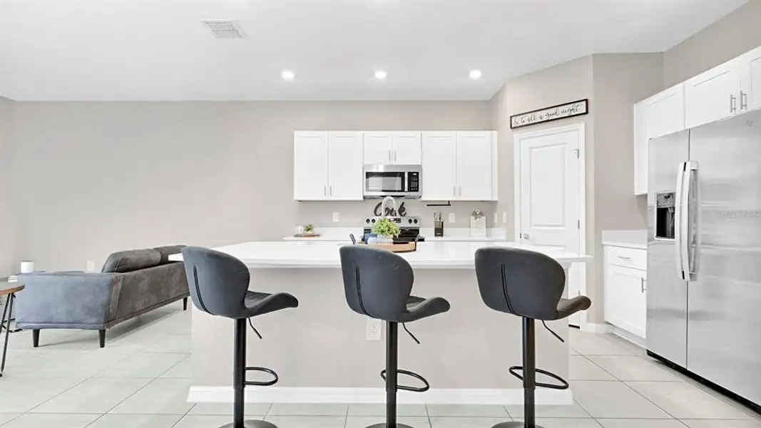 Furnished interior view inside a new home in , Kissimmee (Image 13).