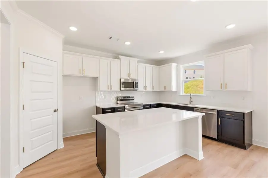 Furnished interior view inside a new home in Clark Farms, Flowery Branch (Image 8).