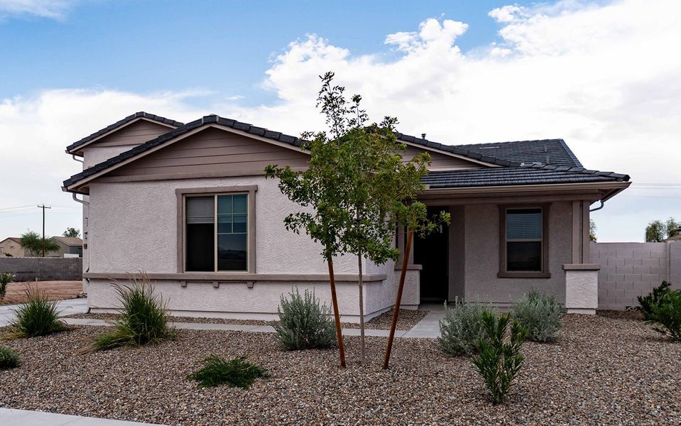 Front exterior of a new home in Rancho Mirage, Maricopa, AZ, highlighting curb appeal (Image 4). Front exterior of a new home in Rancho Mirage, Maricopa, AZ, highlighting curb appeal (Image 4).