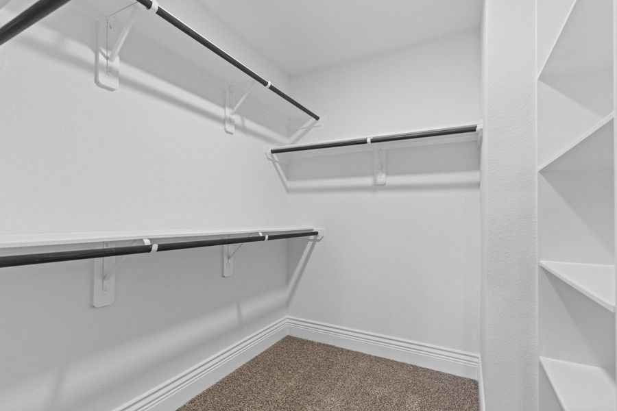 The primary suite features a massive walk-in closet, and what you’re seeing here is only half of it. Check the documents to see just how impressive this space truly is, or better yet, call us today and let us show you in person! The primary suite features a massive walk-in closet, and what you’re seeing here is only half of it. Check the documents to see just how impressive this space truly is, or better yet, call us today and let us show you in person!