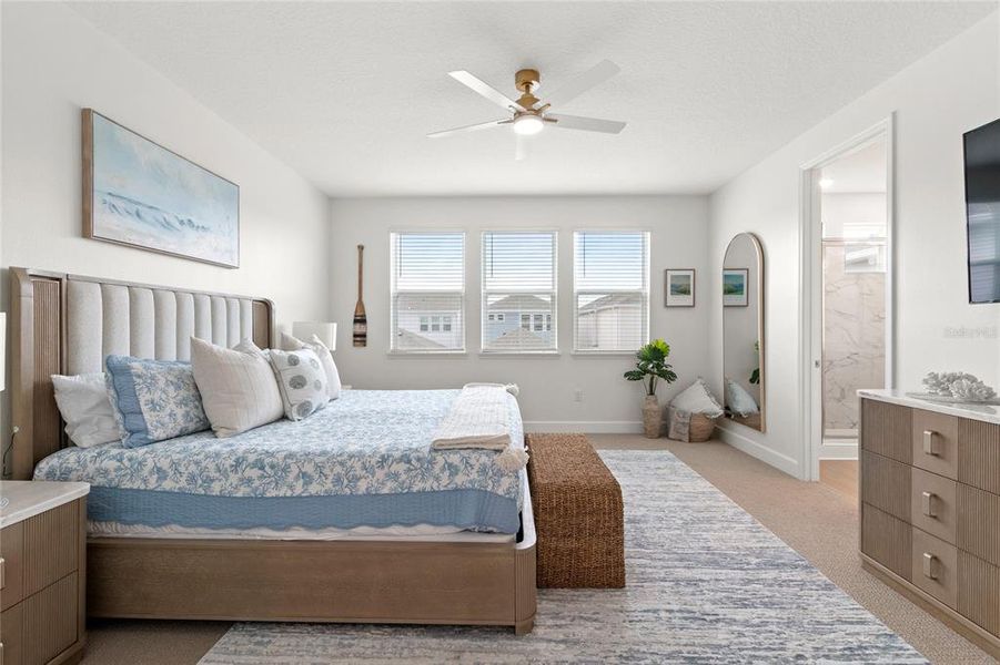 Furnished interior view inside a new home in Harvest at Ovation, Winter Garden (Image 14).