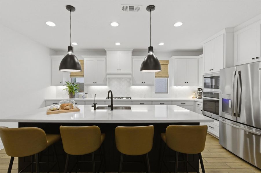 Furnished interior view inside a new home in Wolf Ranch, Georgetown (Image 14).