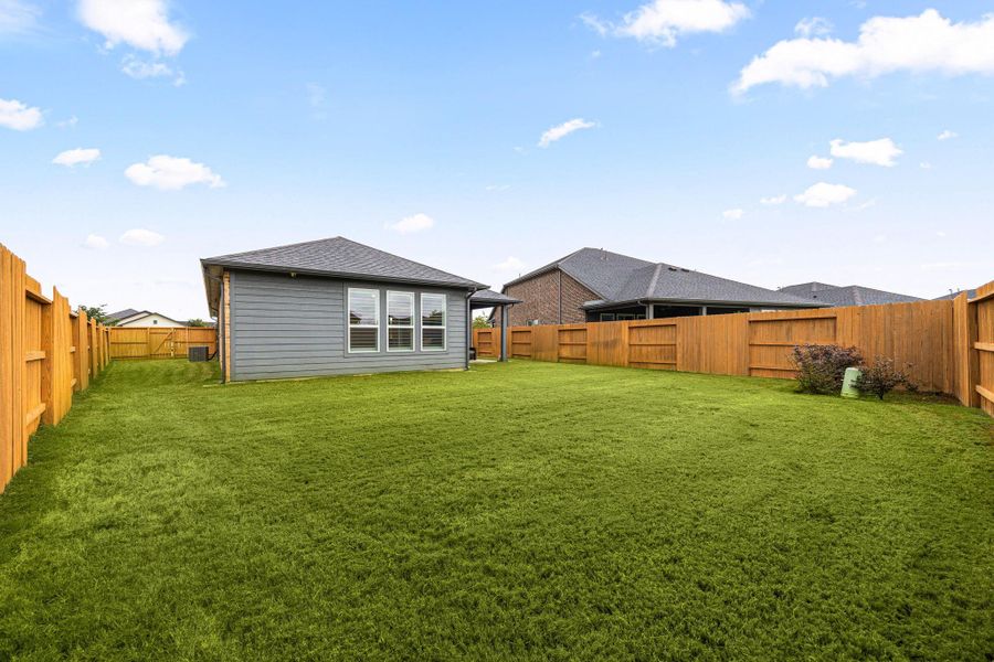Exterior details and patio area of a home in Bonterra at Cross Creek Ranch 45s - Age 55+, Fulshear (Image 24).
