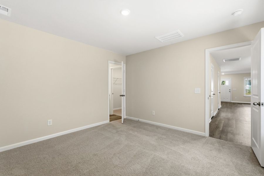 Representative unfurnished interior of a home built from the Dogwood B 1-Car by McGuinn Homes in Select Homesites Ridgeland, Ridgeland (Image 18).