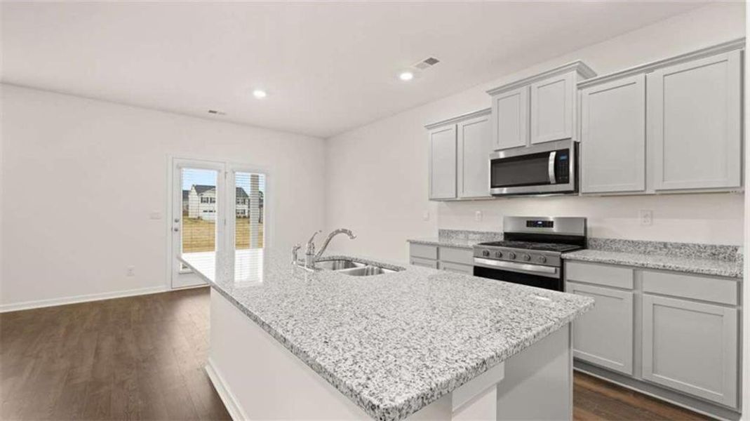 Furnished interior view inside a new home in Champion's Run, Lithonia (Image 3).