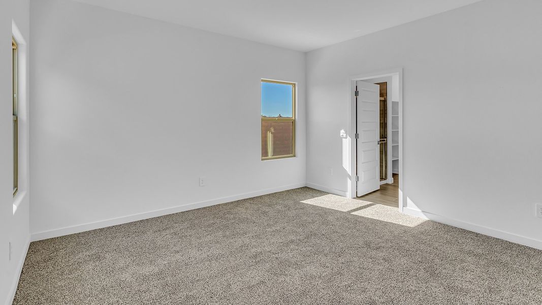 Representative unfurnished interior of a home built from the Parker by D.R. Horton in The Oasis at Rocking K, Vail (Image 40).
