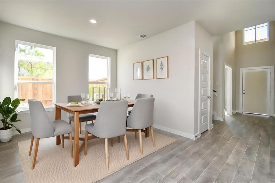 *Virtually Staged* Dining Room. Sample photo of completed home with similar floor plan. Actual colors and selections may vary.