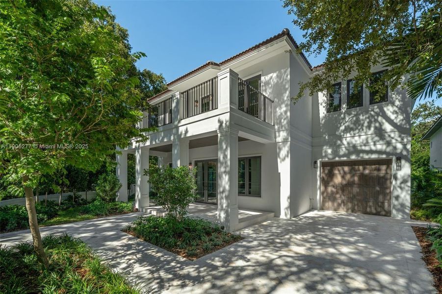 Front exterior of a new home in , Miami, FL, highlighting curb appeal (Image 10). Front exterior of a new home in , Miami, FL, highlighting curb appeal (Image 10).