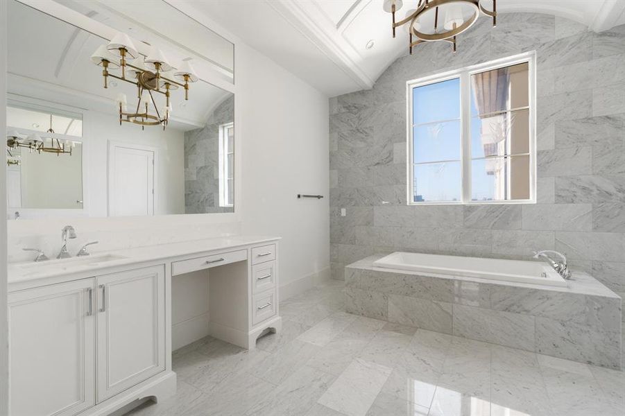 "Her" vanity also offers a built-in vanity space with in-drawer organization for blowdryers/iron/curler etc. (photo of interior model home with smaller floor plan)