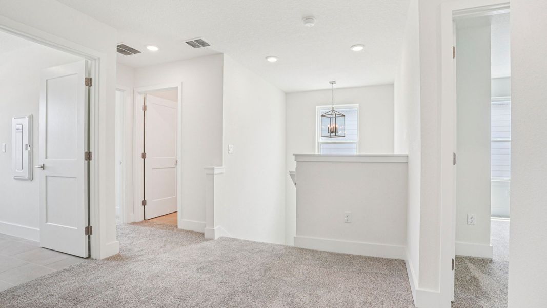 Versatile loft for office or entertainment in the Plumeria plan at Lakeside at Satilla by DRB Homes. Versatile loft for office or entertainment in the Plumeria plan at Lakeside at Satilla by DRB Homes.