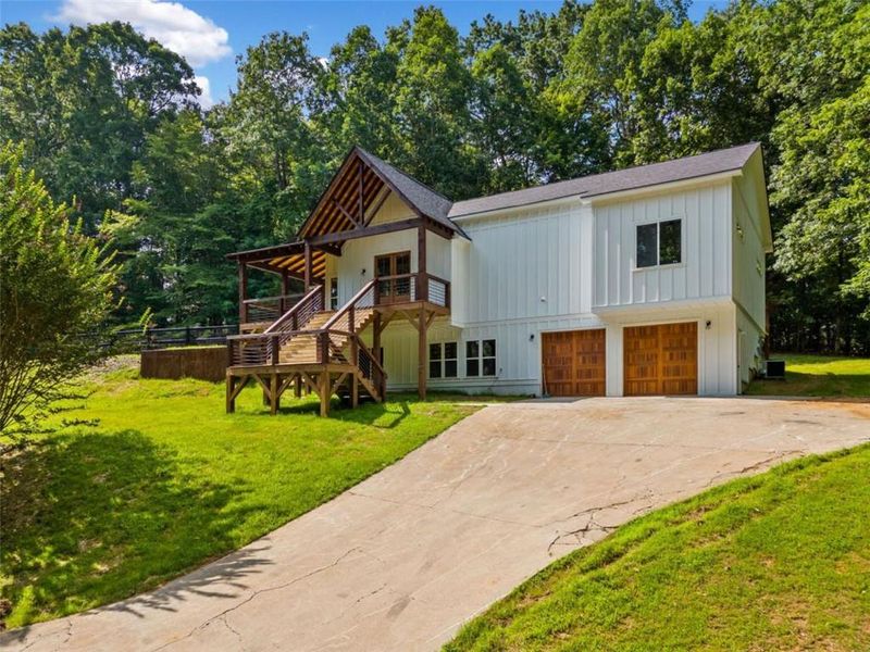 Front exterior of a new home in , Ellijay, GA, highlighting curb appeal (Image 21).
