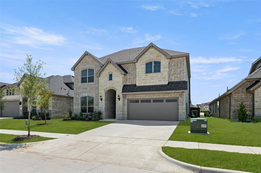 Front exterior of a new home in The Retreat - Phase 1, Waxahachie, TX, highlighting curb appeal (Image 18).