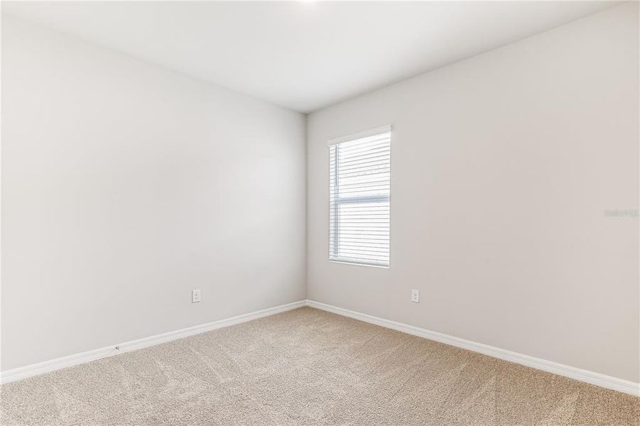 Spacious, unfurnished interior of a new home in Seagrass, Punta Gorda (Image 18).