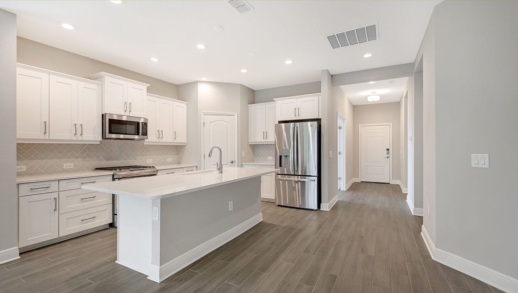 Furnished interior view inside a new home in Boca Royale Golf and Country Club at Wellen Park, Englewood (Image 8).