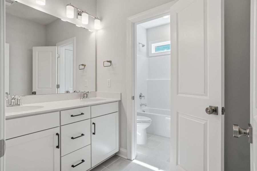 Furnished interior view inside a new home in Tidewater at Lakes of Cane Bay, Summerville (Image 42).