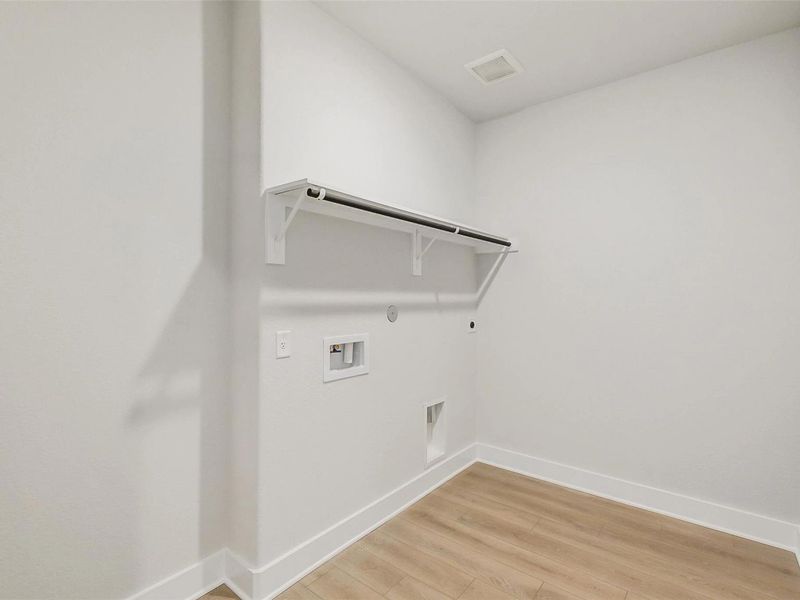 Spacious, unfurnished interior of a new home in Sunterra, Katy (Image 40).