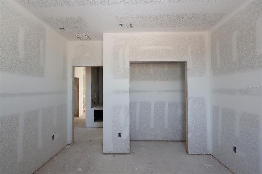 In-progress construction of a new home in Lake Star at Ovation, Winter Garden, FL (Image 22).