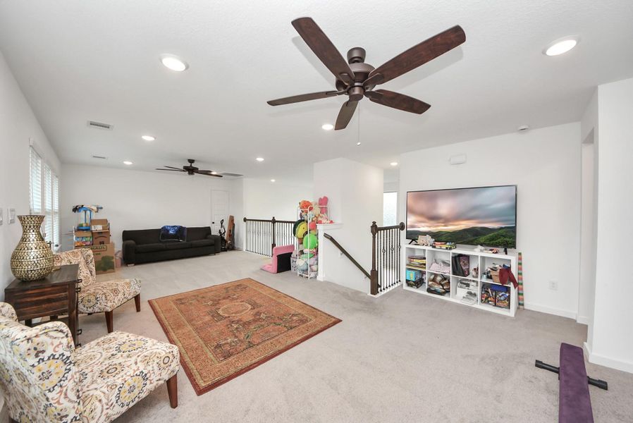Another view of spacious upstairs gameroom offering plenty of room for play or relaxation.