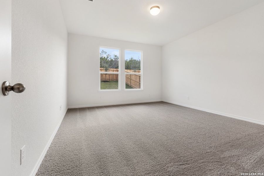 Spacious, unfurnished interior of a new home in Hidden Bluffs at TRP, San Antonio (Image 23).
