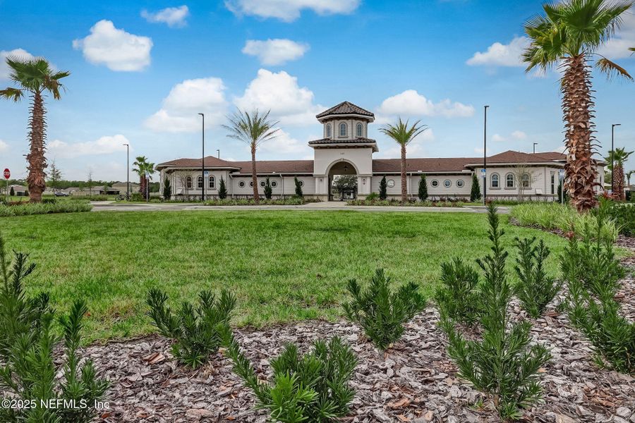 Front exterior of a new home in Dorado at Entrada, St. Augustine, FL, highlighting curb appeal (Image 20).