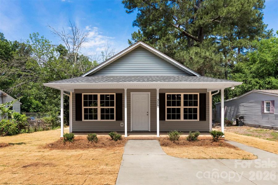 Front exterior of a new home in , Rock Hill, SC, highlighting curb appeal (Image 1). Front exterior of a new home in , Rock Hill, SC, highlighting curb appeal (Image 1).