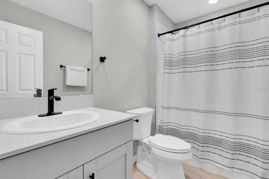 Furnished interior view inside a new home in Crosswind Point, Parrish (Image 17).