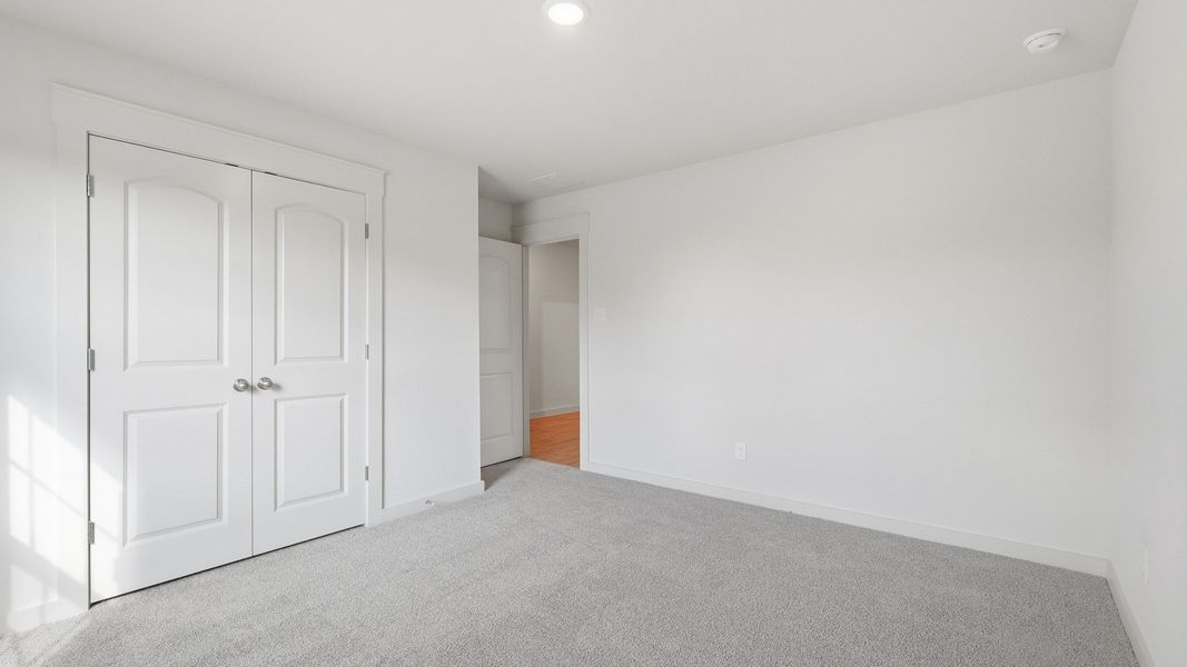 Furnished interior view inside a new home in Patriot Estates, Venus (Image 9).