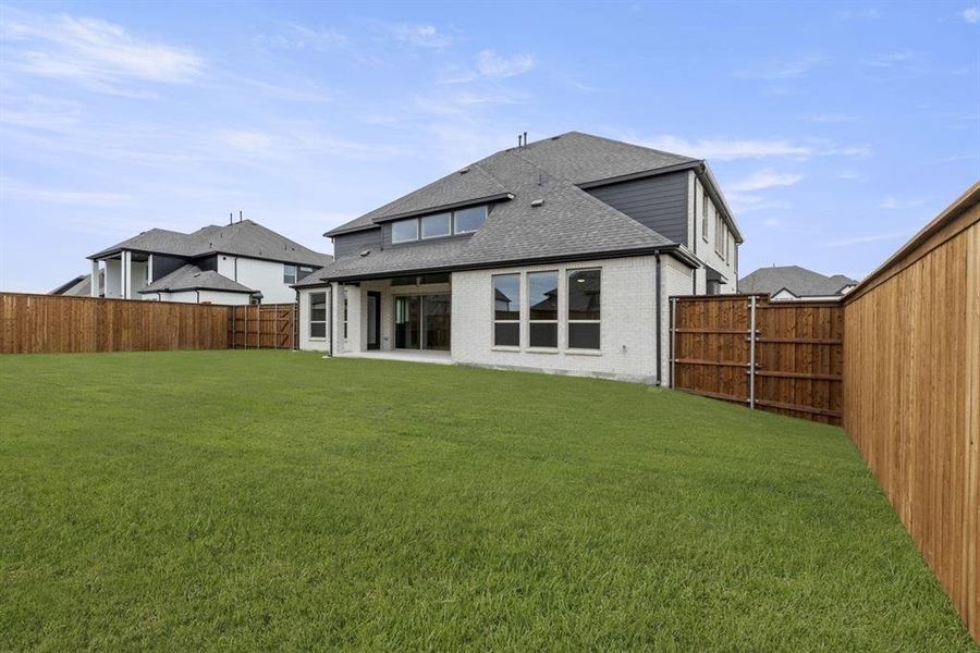 Exterior details and patio area of a home in Cambridge Estates, Prosper (Image 4). Exterior details and patio area of a home in Cambridge Estates, Prosper (Image 4).