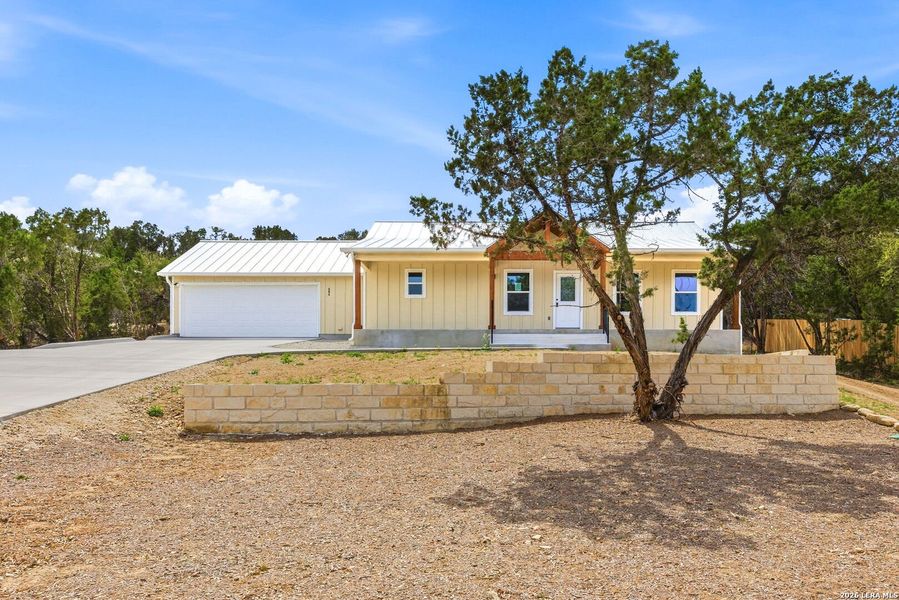 Front exterior of a new home in , Fischer, TX, highlighting curb appeal (Image 28).