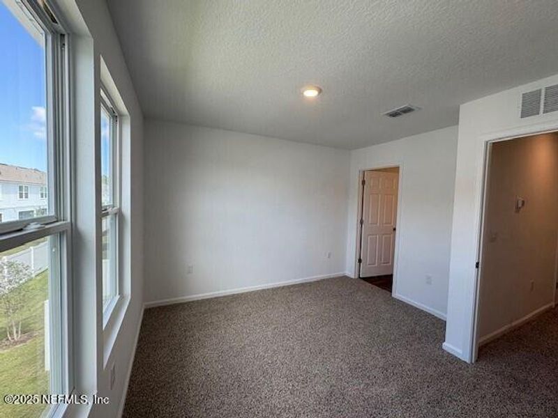 Spacious, unfurnished interior of a new home in Cordera Townhomes Express, St. Augustine (Image 22).