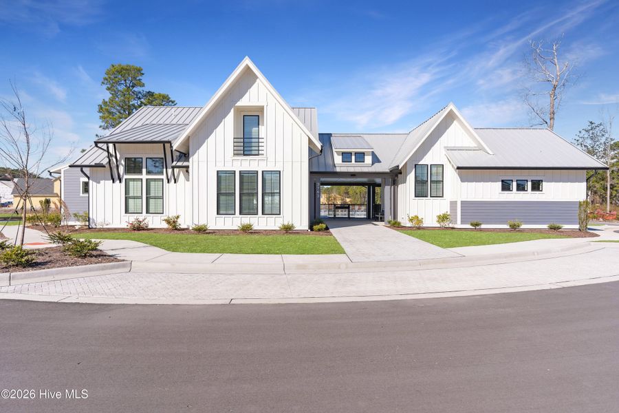 Front exterior of a new home in East & Mason, Wilmington, NC, highlighting curb appeal (Image 24). Front exterior of a new home in East & Mason, Wilmington, NC, highlighting curb appeal (Image 24).