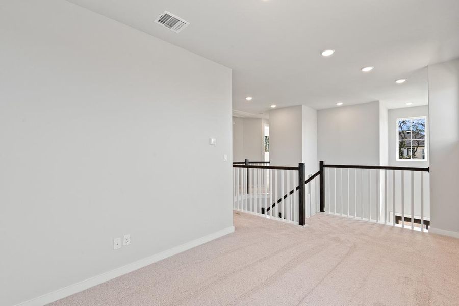 Spacious, unfurnished interior of a new home in Terrace Collection at Heritage, Dripping Springs (Image 22).