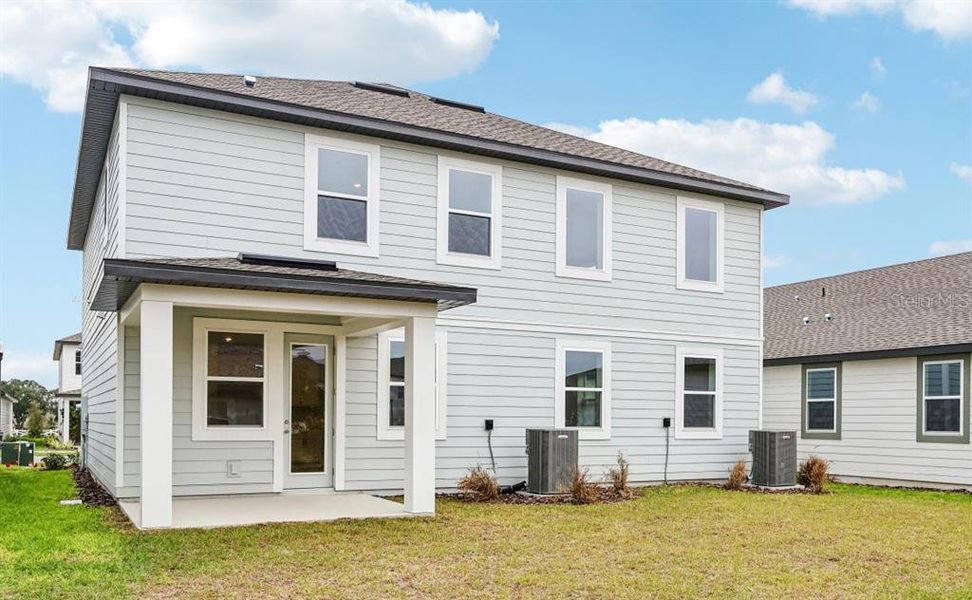 Exterior details and patio area of a home in Trailside, Mount Dora (Image 14).