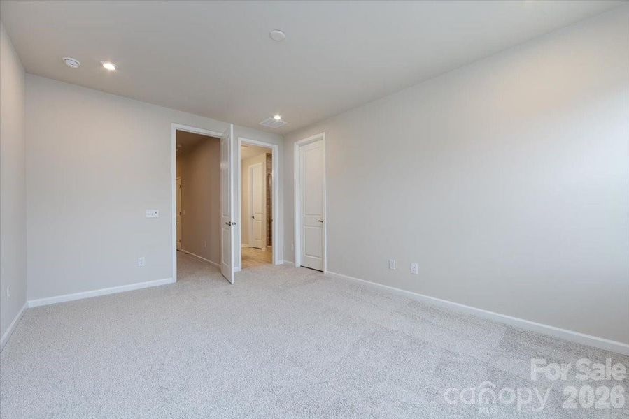 Light filled primary bedroom