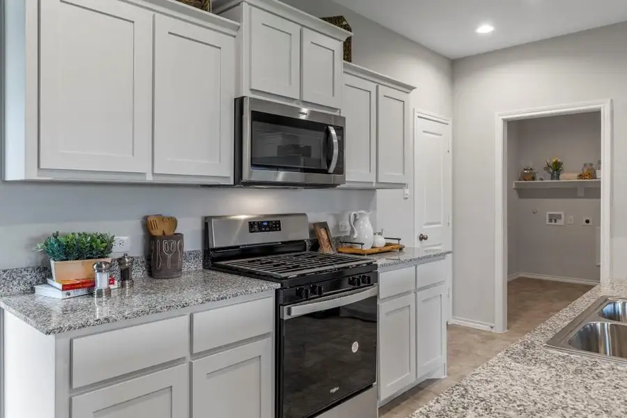 Furnished interior view inside a new home in Springhill South, Boyd (Image 4).