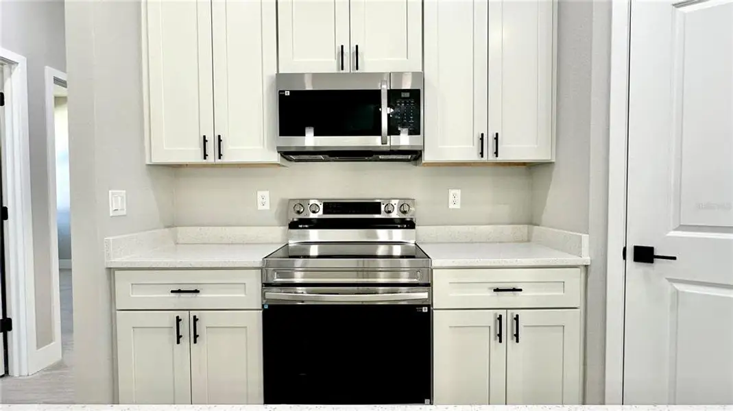 Furnished interior view inside a new home in , Poinciana (Image 5).