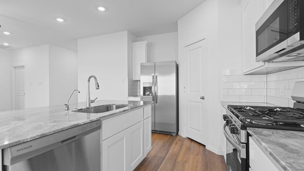 Furnished interior view inside a new home in Caldwell Crossing, Iowa Colony (Image 4). Furnished interior view inside a new home in Caldwell Crossing, Iowa Colony (Image 4).