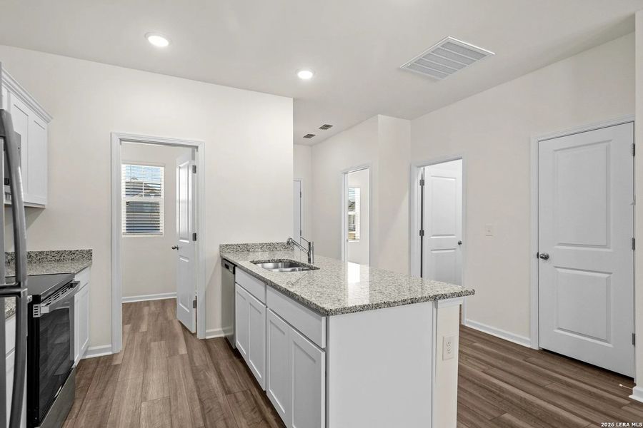 Furnished interior view inside a new home in Sutton Farms, San Antonio (Image 7).