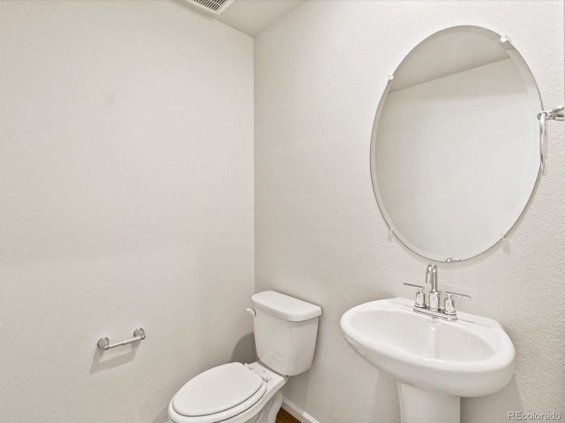 Furnished interior view inside a new home in Skyview at High Point, Aurora (Image 10).