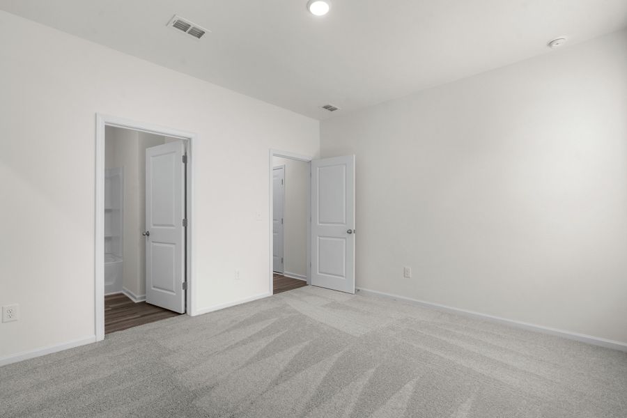 Representative unfurnished interior of a home built from the Europa by Starlight Homes in Andalusia, Loris (Image 22).